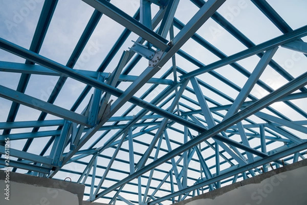 Obraz Structure of steel roof frame for building construction.