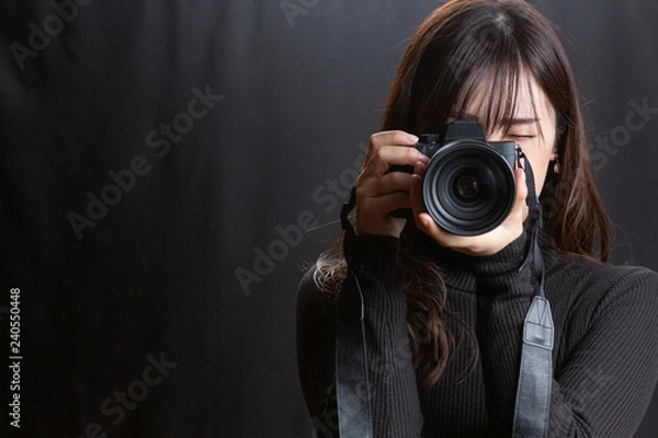 Obraz カメラを構える女性