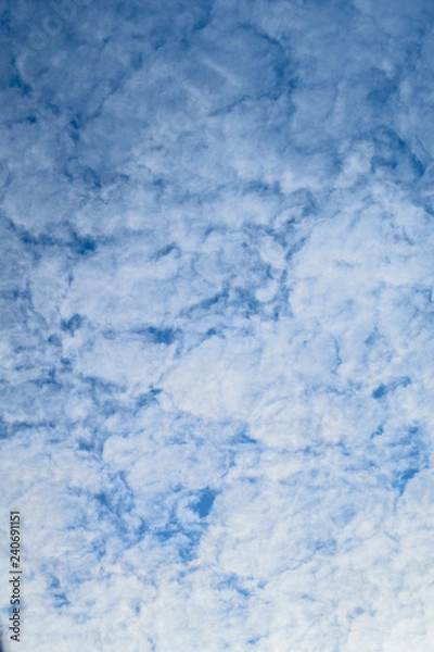 Obraz blue background of sky with fluffy clouds