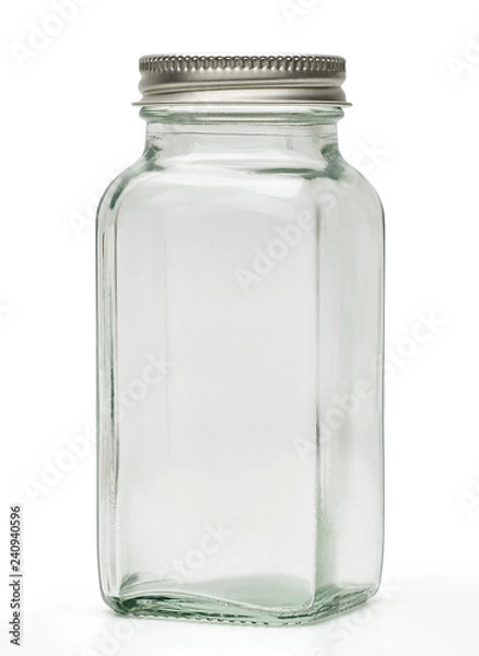 Fototapeta Clear empty glass canister or jar with silver cap isolated on white background with clipping path