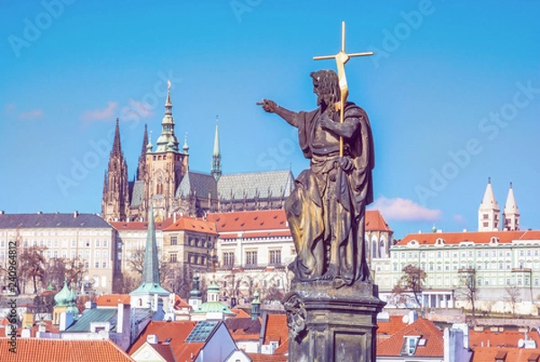 Fototapeta Statue of saint, Charles Bridge and Prague castle, Czech