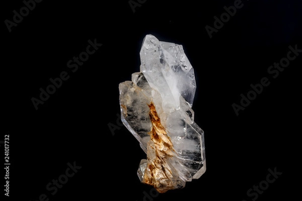 Fototapeta Macro mineral stone Flattened crystal of rock crystal on a black background