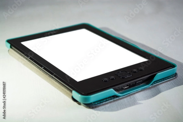 Fototapeta The portable e-book with the clean and white screen.