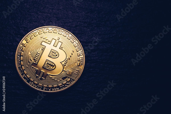 Fototapeta Crypto currency golden coin with bitcoin symbol on isolated on black background. Bitcoin Coin on black background. Bitcoin cryptocurrency.  Cryptocurrency Coin Concept.