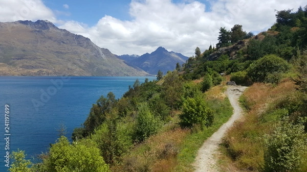 Fototapeta This photo is taken in New Zealand. It was a beautiful day for a day hike around a blue lake. The scenery is amazing.