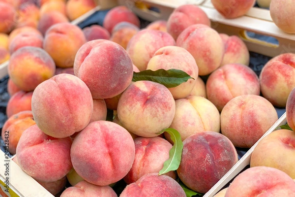 Fototapeta Pile of peaches (close up view, selective focus)