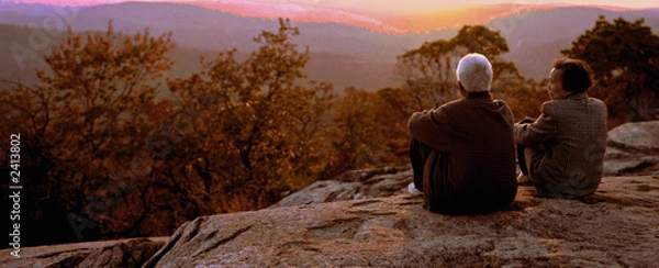 Obraz old oriental couple at sunset