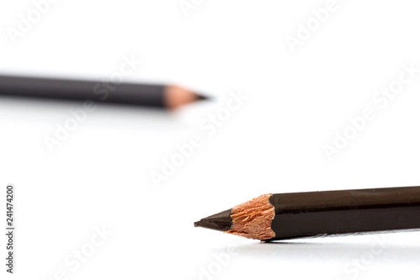 Obraz Black pencil for eyes. Realistic eyeliner with cap. Decorative cosmetic product - liner for beautiful makeup, on white background.