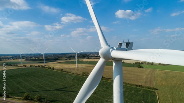 Fototapeta Close-up of Wind Turbine - Windfarm in Horizon