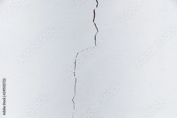 Fototapeta White cement wall cracks texture background