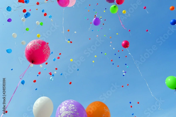 Obraz Multicolored balloons against the blue sky
