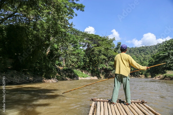 Fototapeta Bamboo rafting on river in jungle, Chiang Mai