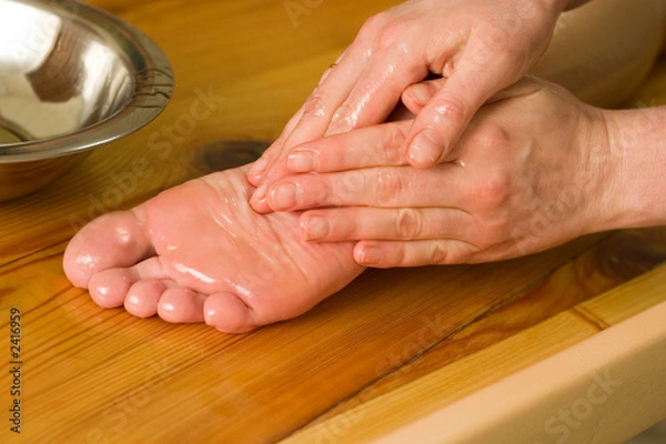 Fototapeta ayurvedic oil foot massage