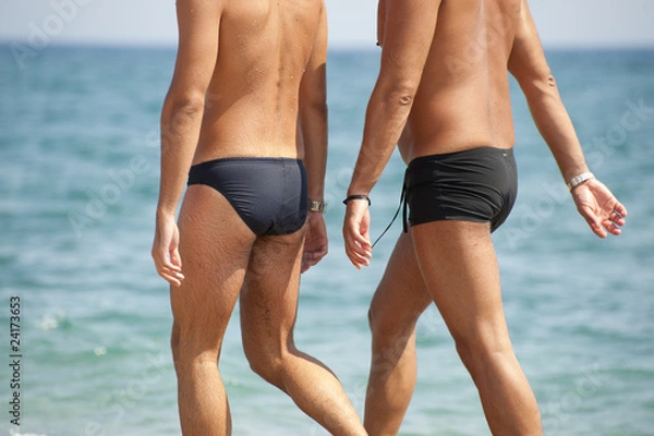 Fototapeta Two men at the beach