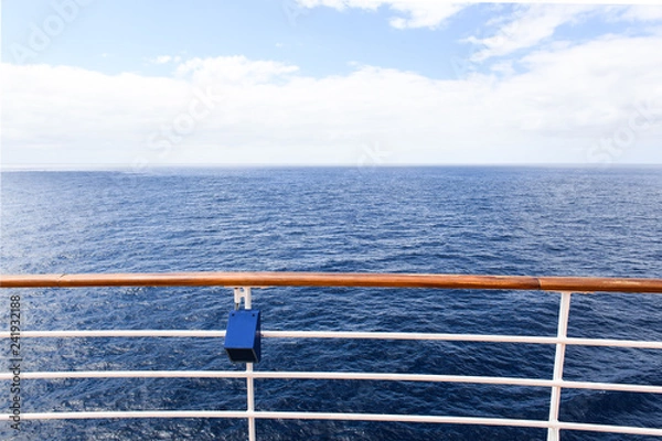Obraz Steel and metal railing of a cruise ship with he ocean in the background