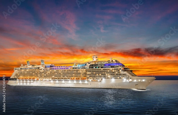 Obraz Luxury cruise ship sailing to port on sunset. 