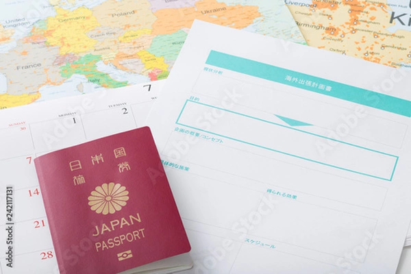 Obraz 海外出張計画書とパスポート