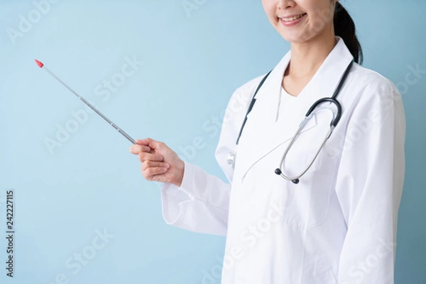 Fototapeta 指示棒を持った医者 