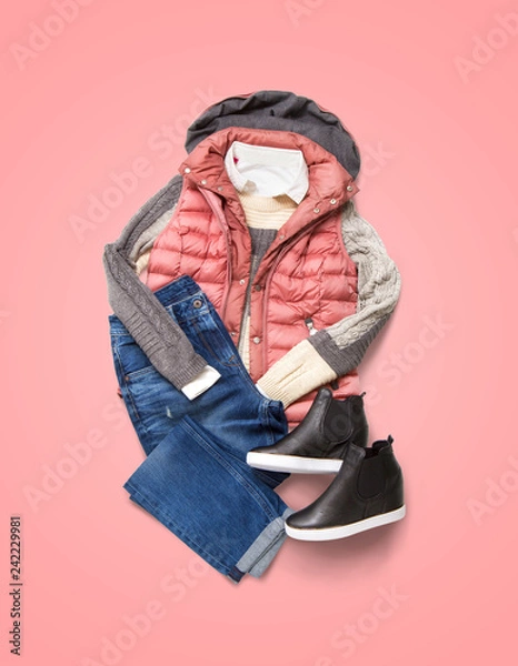 Obraz Collection of winter women clothing on pink background. Composition with jacket, jeans and shoes