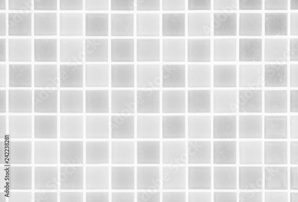 Fototapeta White or gray ceramic wall and floor tiles abstract background. Design geometric mosaic texture for the decoration of the bedroom. Simple seamless pattern for backdrop advertising banner poster or web