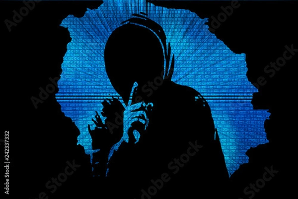 Obraz Silhouette of a hacker on a background with binary code