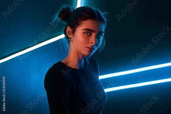 Obraz Portrait of a girl in the studio with neon light
