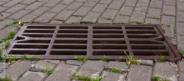 Fototapeta Grid manhole cover