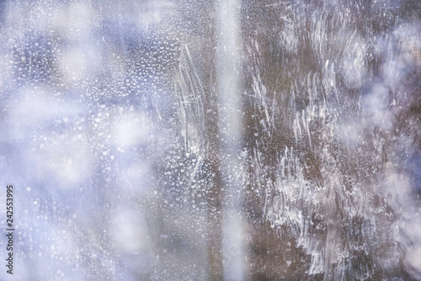 Fototapeta Reflection and stains on dirty window glass