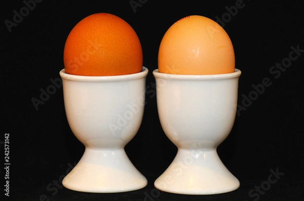 Fototapeta Two eggs in an egg cup