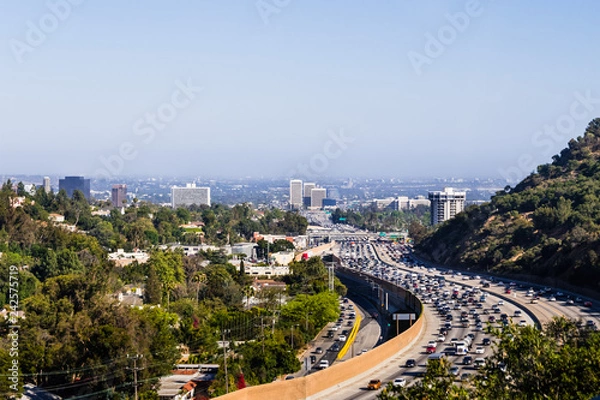 Fototapeta View toward West Los Angeles on a hazy day; heavy traffic on highway 405; California