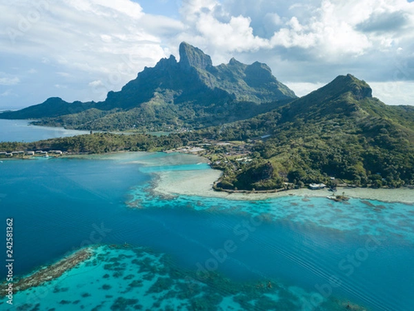 Fototapeta Aerial image from a drone of blue lagoon and Otemanu mountain at Bora Bora island, Tahiti, French Polynesia, South Pacific Ocean (Bora Bora Aerial).