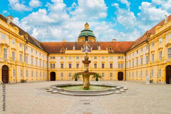 Fototapeta The main courtyard of historic Melk Abbey and blue sky in summer, Austria
