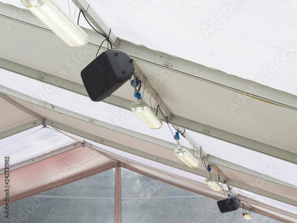 Fototapeta speakers and neon lights on the ceiling of  tensile structure
