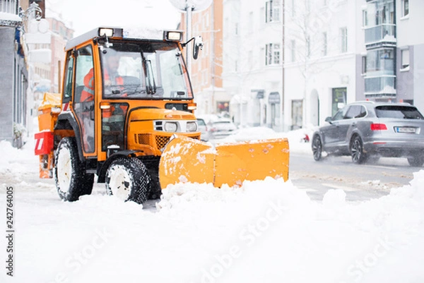 Obraz Schneepflug räumt die Straßen in der Stadt, Winterdienst 