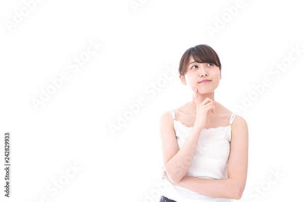 Fototapeta ビューティーケアをする若い女性