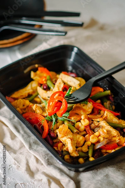 Fototapeta Meat with beans, corn, asparagus beans, sweet peppers, chili peppers and microgreen. Healthy food and diet concept, restaurant dish delivery. Take away of fitness meal. Weight loss nutrition in boxes.