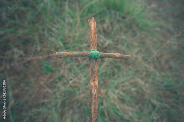 Fototapeta The cross with nature in the forest on the hill is the Blackground.