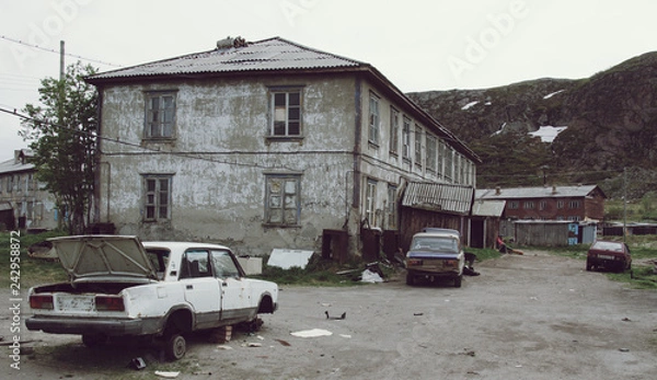 Obraz Broken machine in the slums