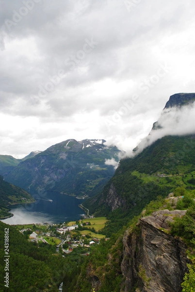 Obraz tall mountains and clouds
