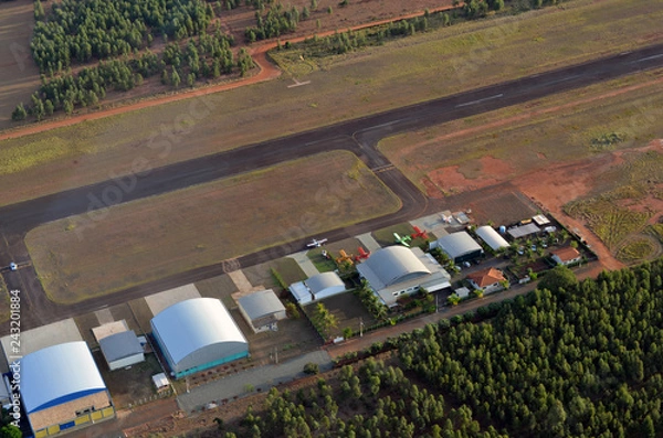 Fototapeta Private hangar with runway airplane, aerial view