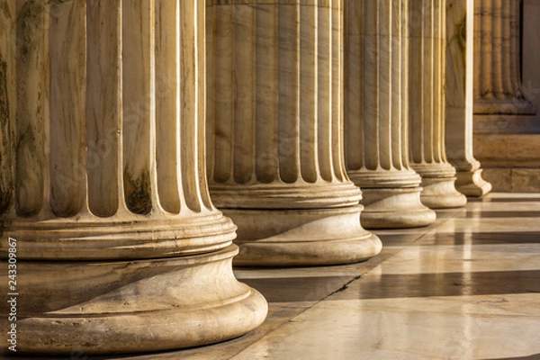 Fototapeta Classical marble pillars detail on the facade of a building