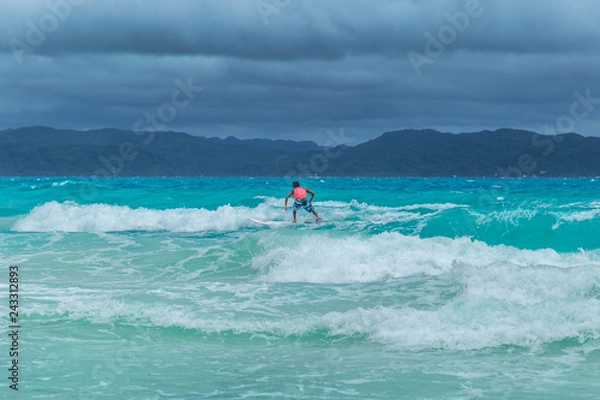 Obraz Surfer on turquoise azure Ocean Wave in Siargao, Philippines