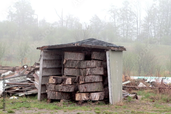 Fototapeta A small storage for log