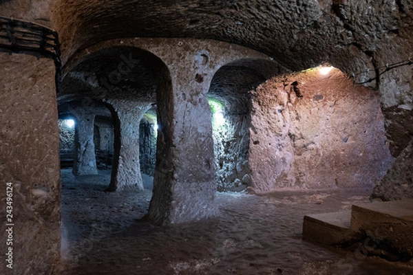 Obraz underground sncient stone tunnel gallery with columns