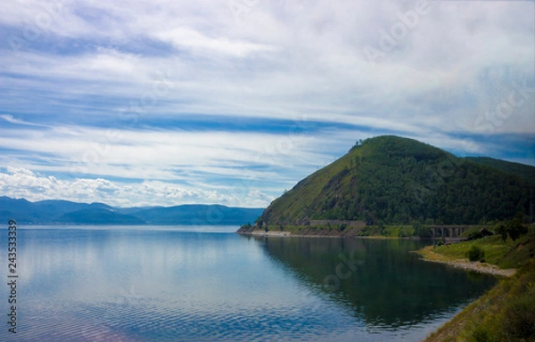 Fototapeta Summer landscape with mountains on lake Baikal. Old bridge on the Circum-Baikal Railway, Siberia. Coastline of most deep clear lake in world