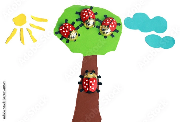 Fototapeta tree with three ladybugs, fourth ladybug creeping up the tree trunk
