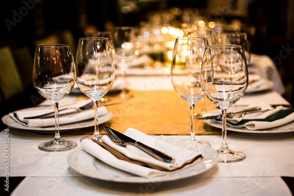 Fototapeta Served dinner table. Restaurant interior