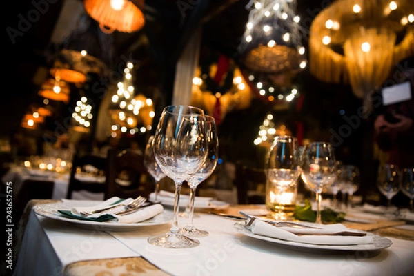 Fototapeta Served dinner table. Restaurant interior