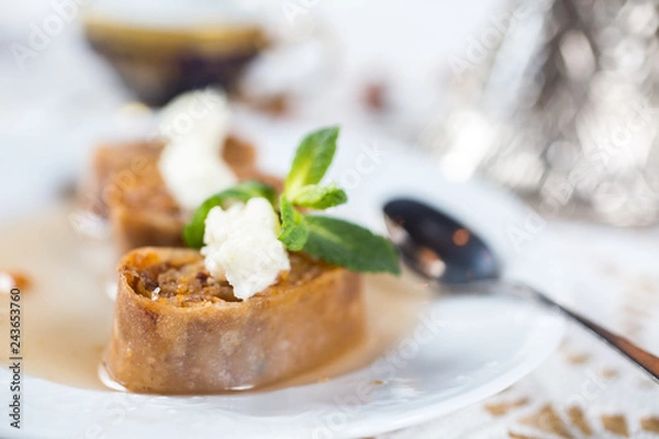 Fototapeta Baklava. Traditional dessert with honey and sour cream