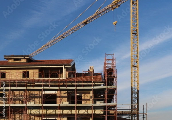 Fototapeta Cantiere edile - gru e ponteggio